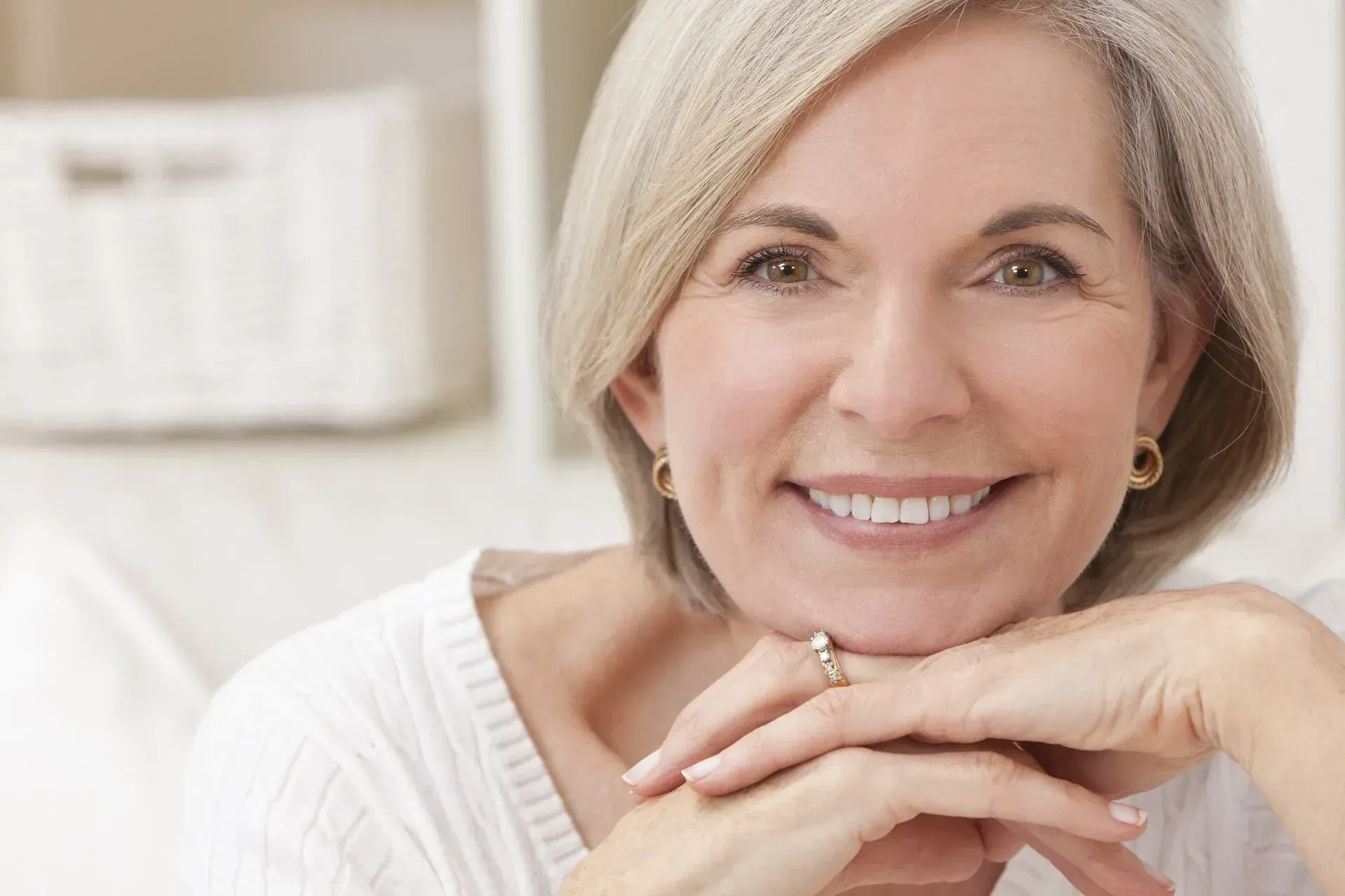 Elegant senior woman smiling and relaxed - All-on-4 dental implants at Neola Dental in Minneola, FL
