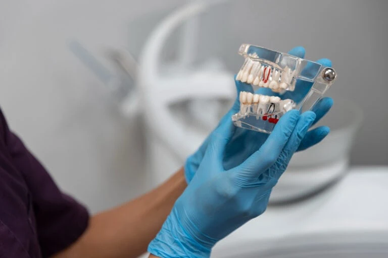 Happy family smiling at Neola Dental in Minneola, FL, during a dental consultation.
