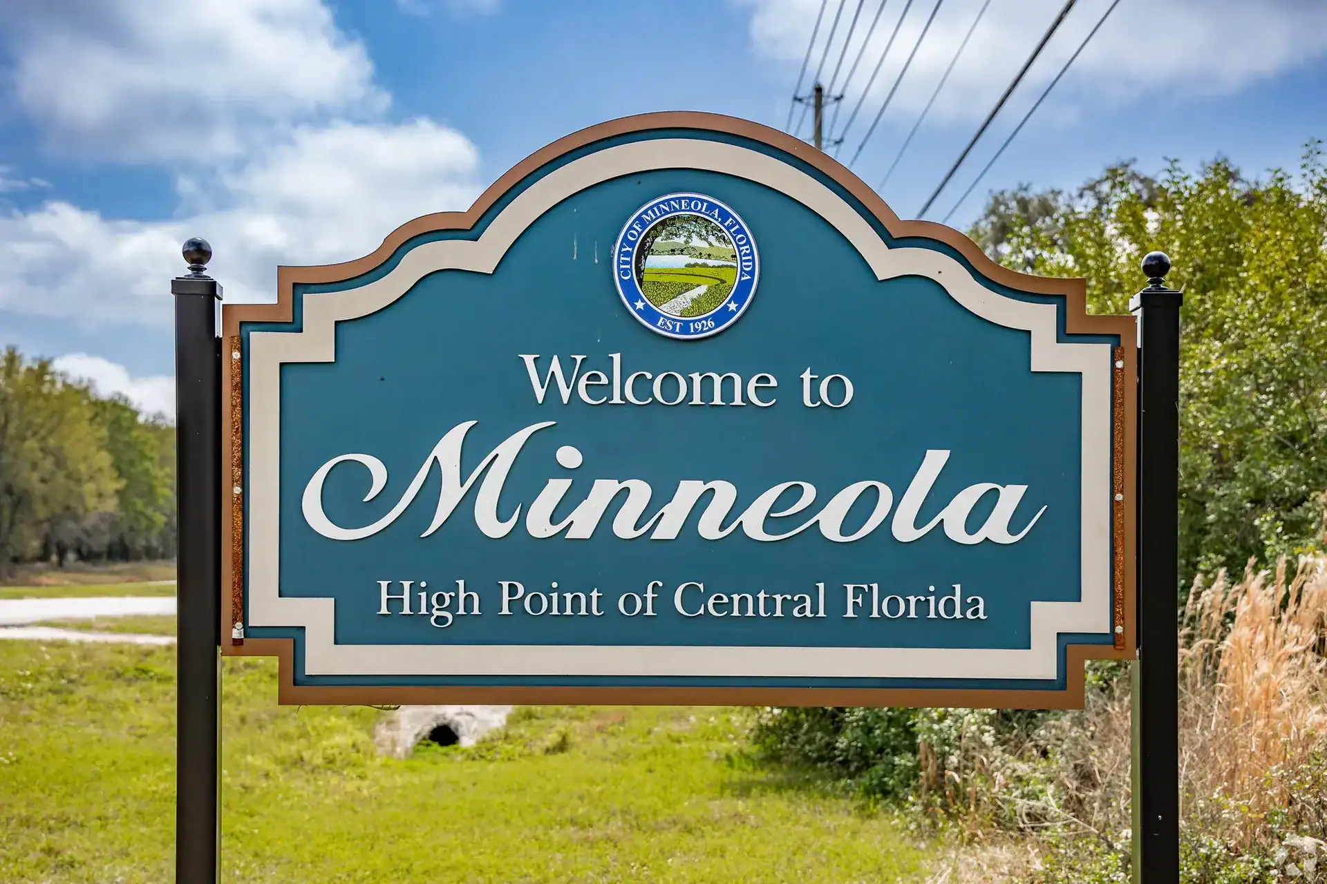 Welcome to Minneola Florida sign - High Point of Central Florida - dental services pricing